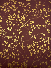 Papel de regalo hojas oro
