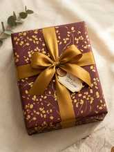 Papel de regalo hojas oro