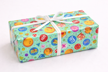 Papel de regalo infantil emojis